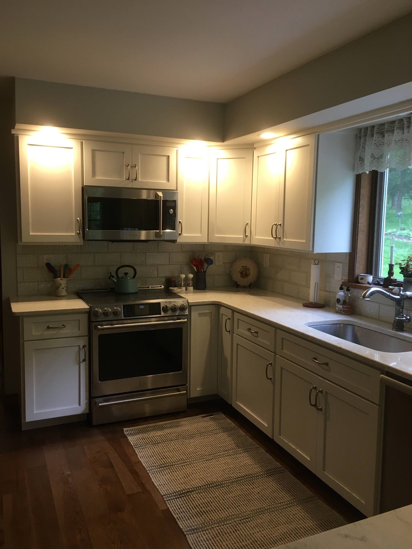 Custom Kitchen Cabinet Refacing with White Flat Panel Doors and Custom Cabinetry Storage